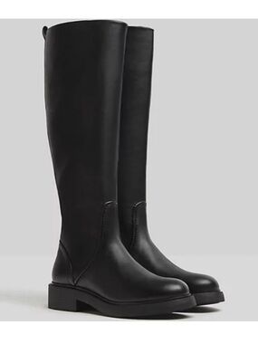 Black flat high knee boots